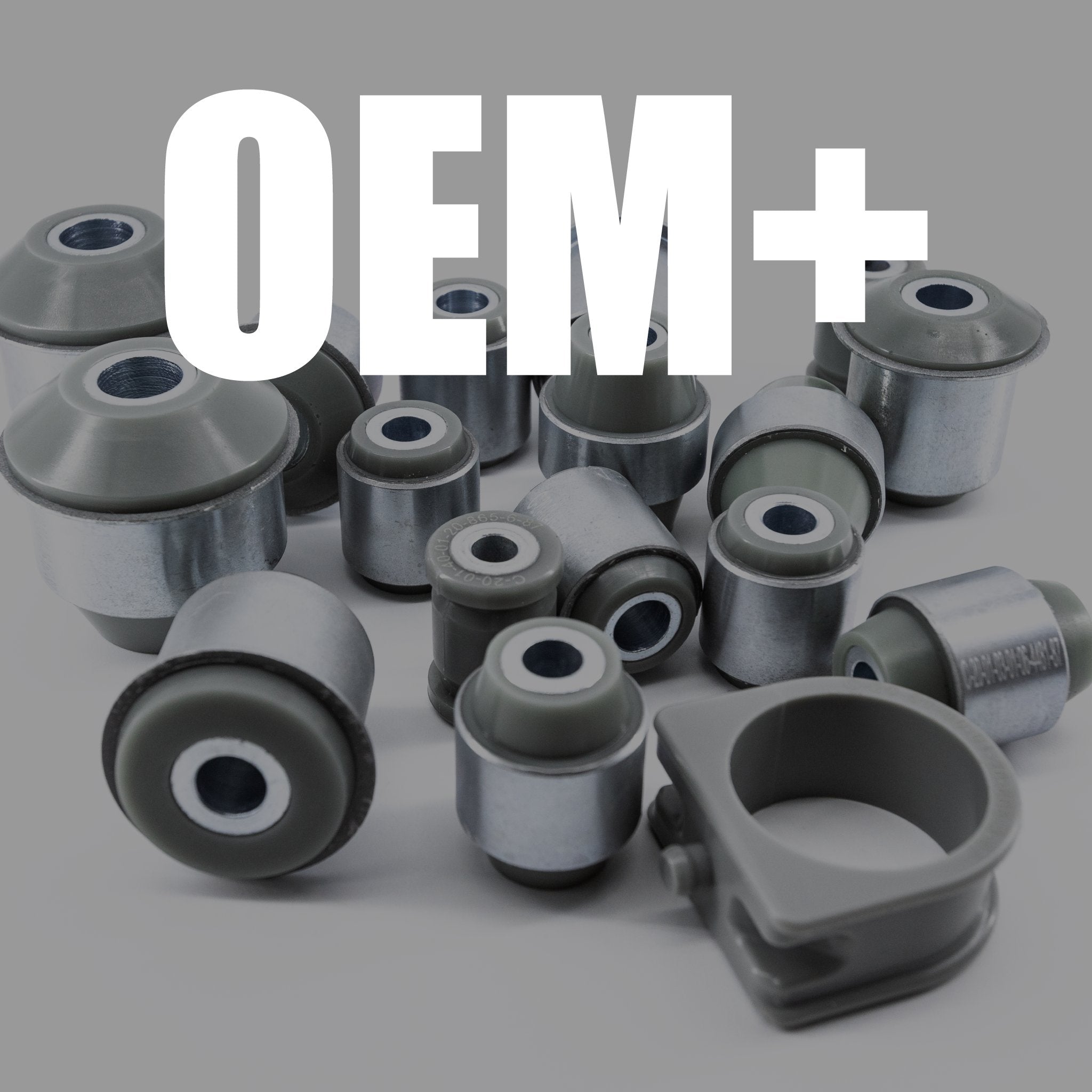 Assortment of SERIALNINE OEM+ polyurethane suspension bushings displayed on a table