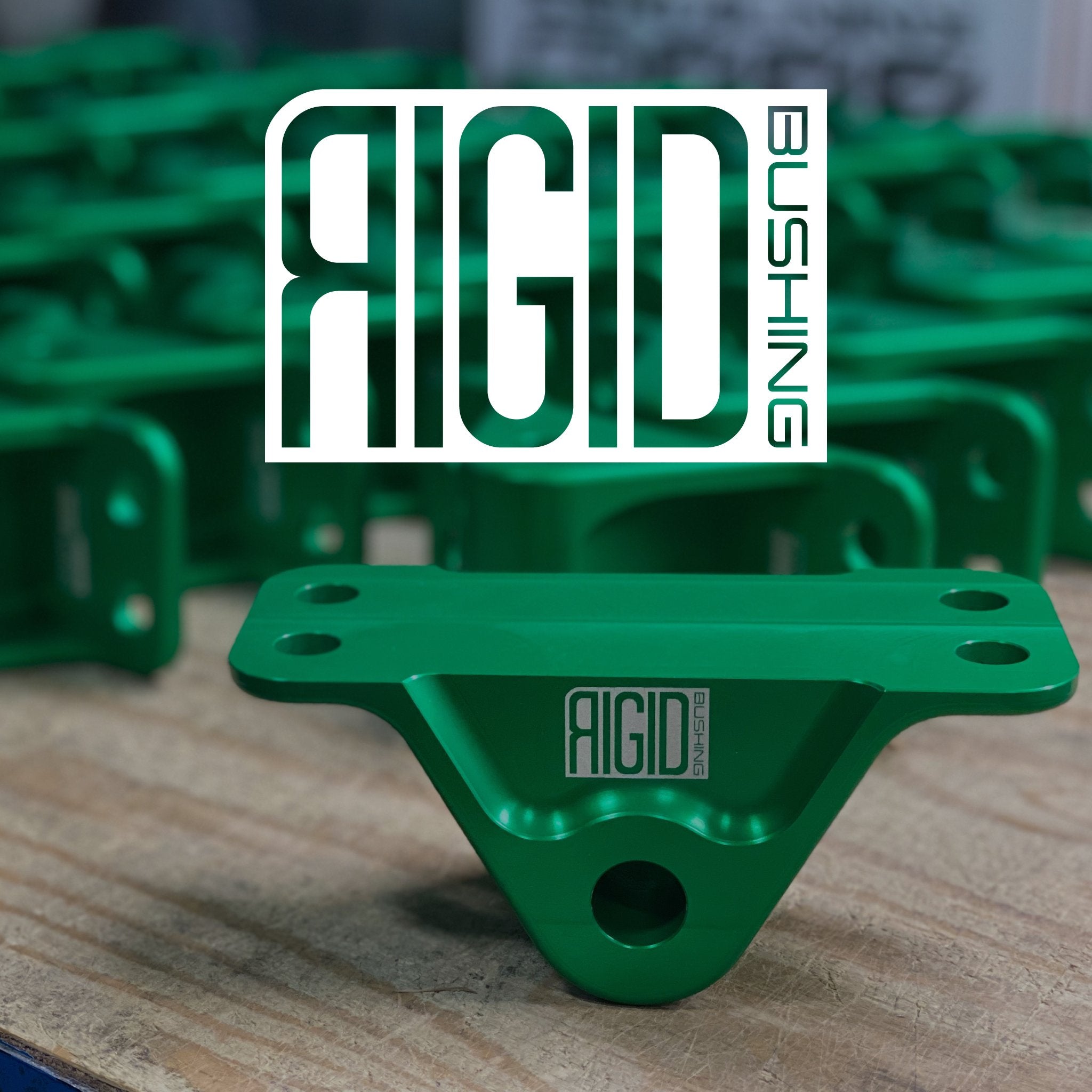 Assorted SERIALNINE solid aluminum subframe bushings displayed on a table