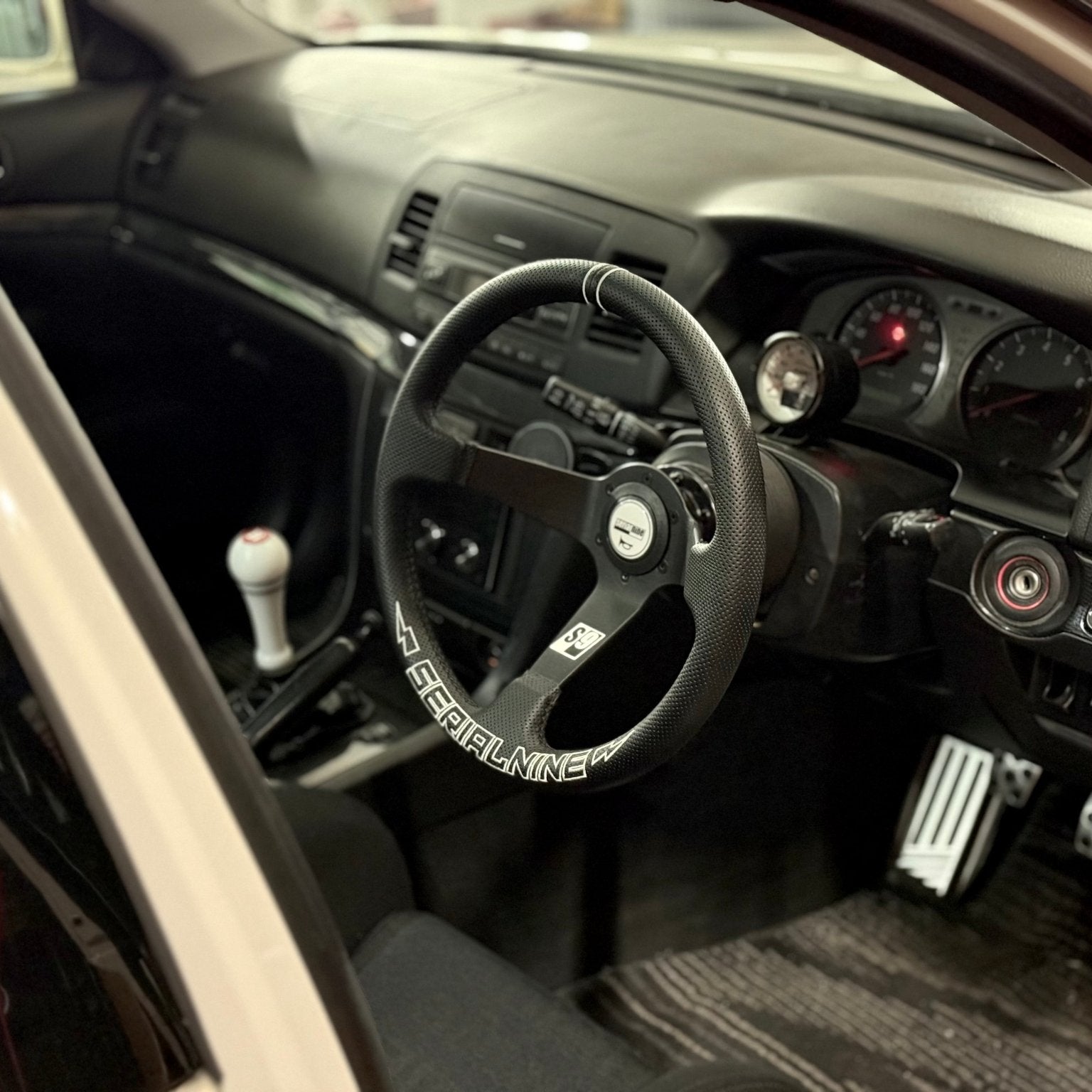 RAIGA Steering Wheel - SERIALNINE