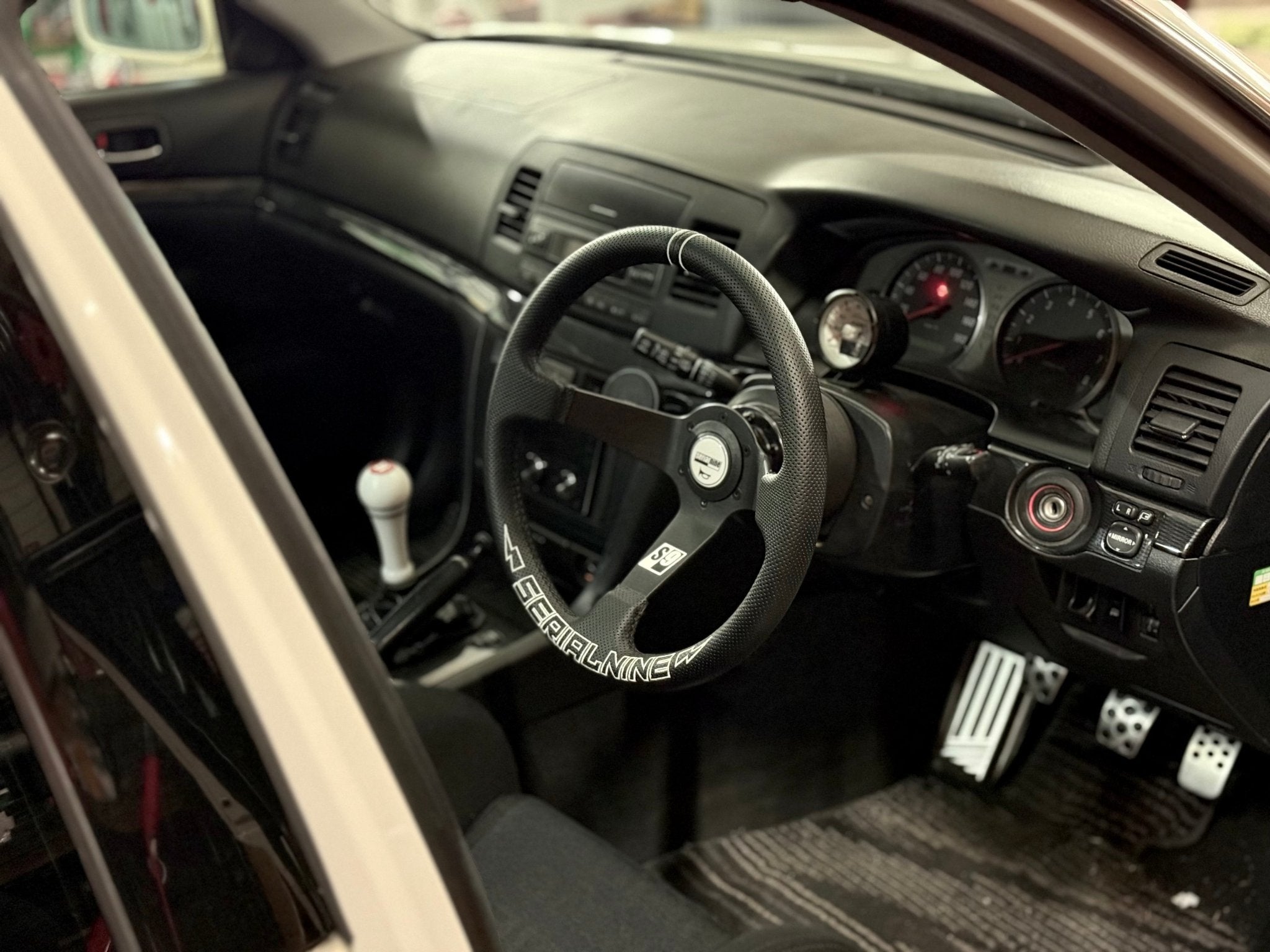 RAIGA Steering Wheel - SERIALNINE