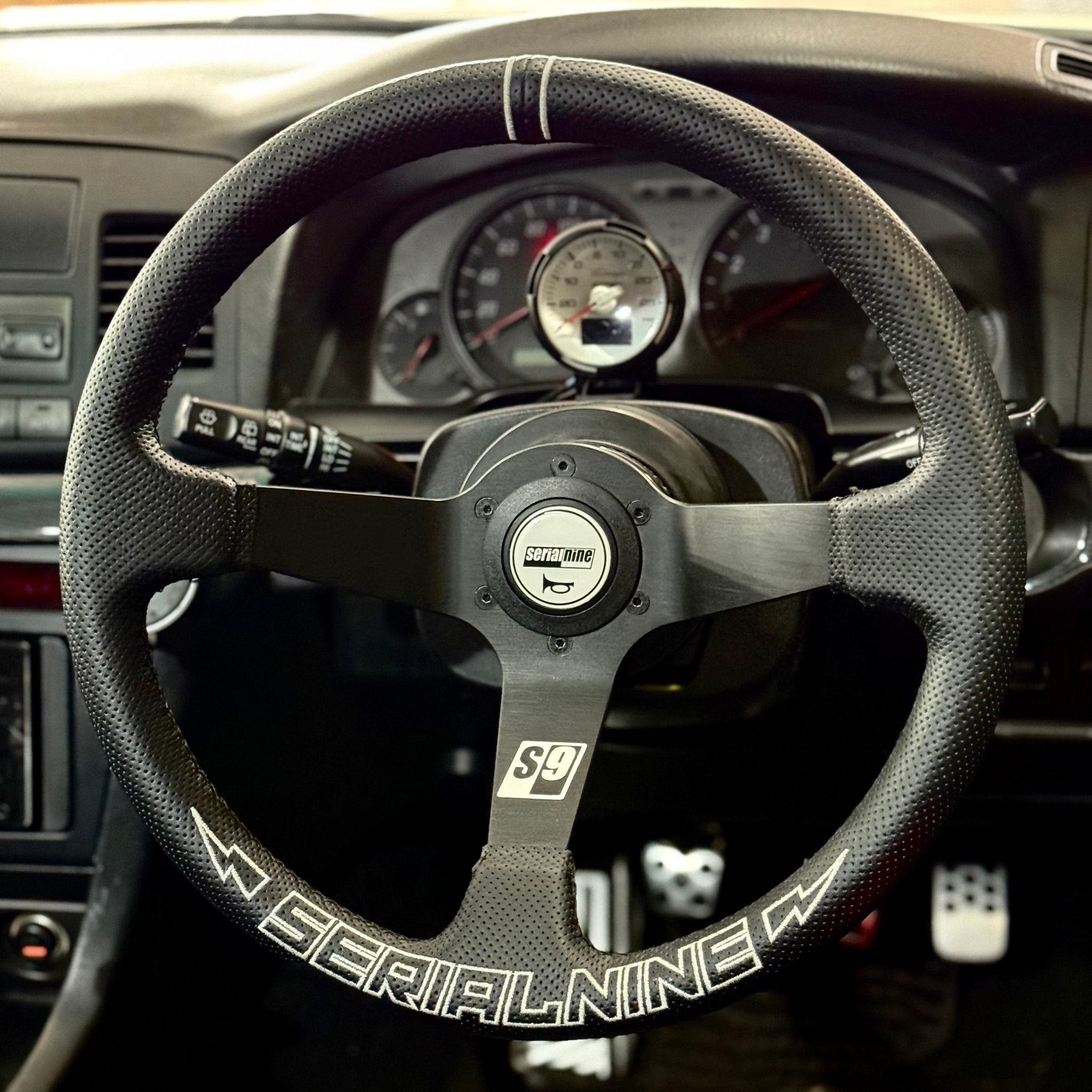 RAIGA Steering Wheel - SERIALNINE